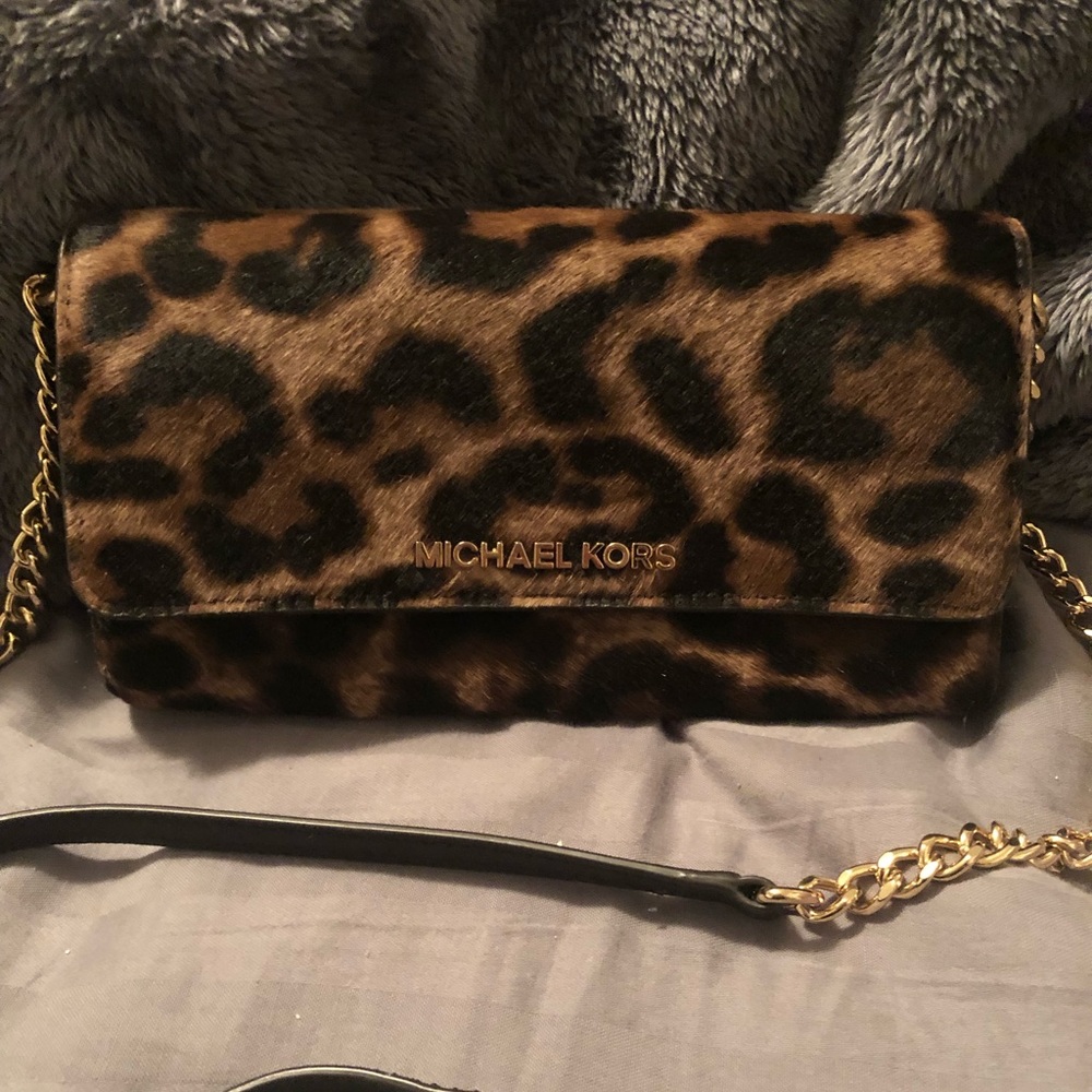 Michael kors cowhide leather crossbody/ wallet.